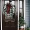 Adorable Front Door Christmas Decoration Ideas That Trend This Year 01