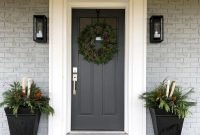 Adorable Front Door Christmas Decoration Ideas That Trend This Year 24