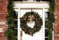 Adorable Front Door Christmas Decoration Ideas That Trend This Year 37
