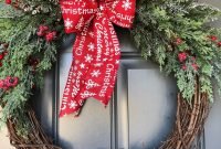 Adorable Front Door Christmas Decoration Ideas That Trend This Year 41